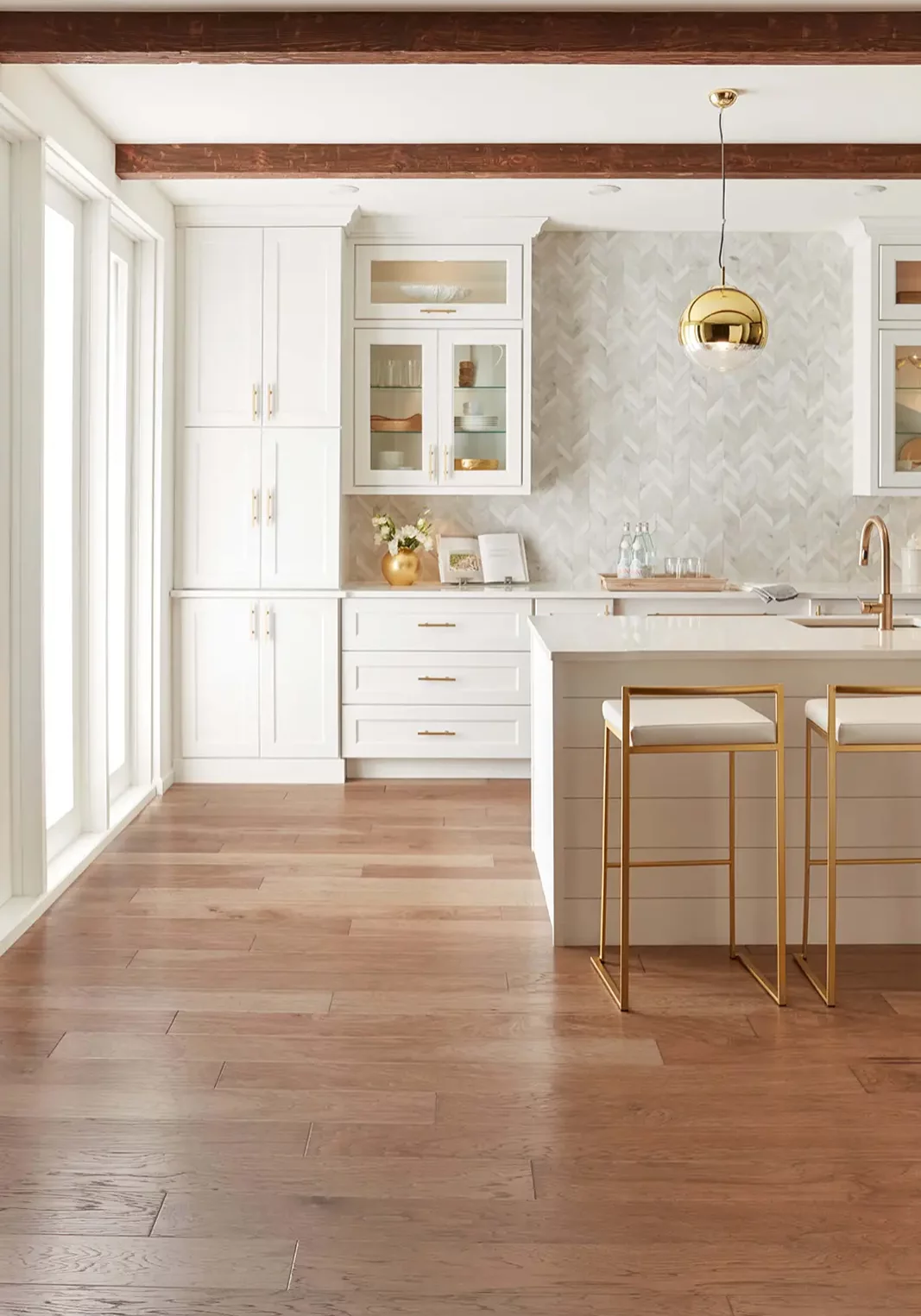Medium brown wood-look tile in white kitchen | AJ Rose Carpets